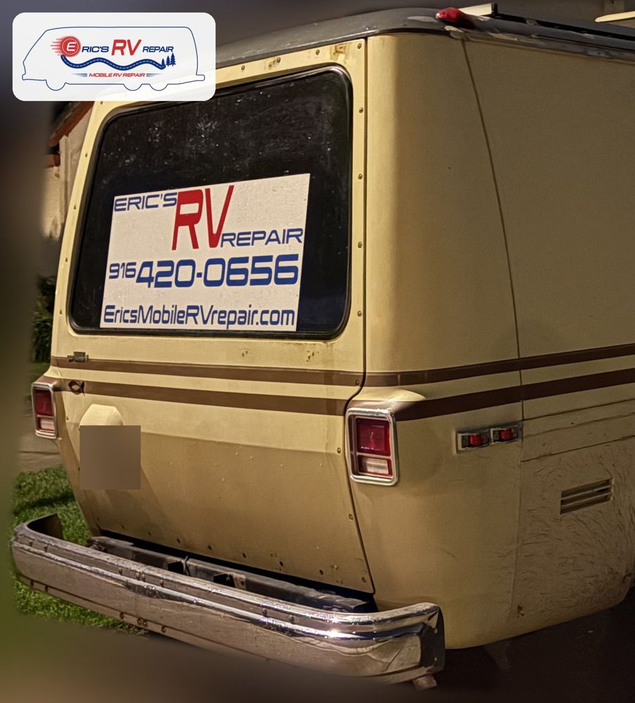 Rear of Eric's classic GMC motorhome with an Eric's RV Repair window sign and phone number 916-420-0656